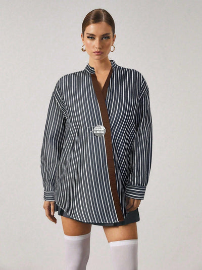 Chemise longue à rayures avec fermeture en métal
