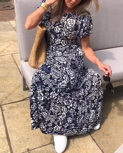 Zaar| Robe longue à manches courtes avec motif floral