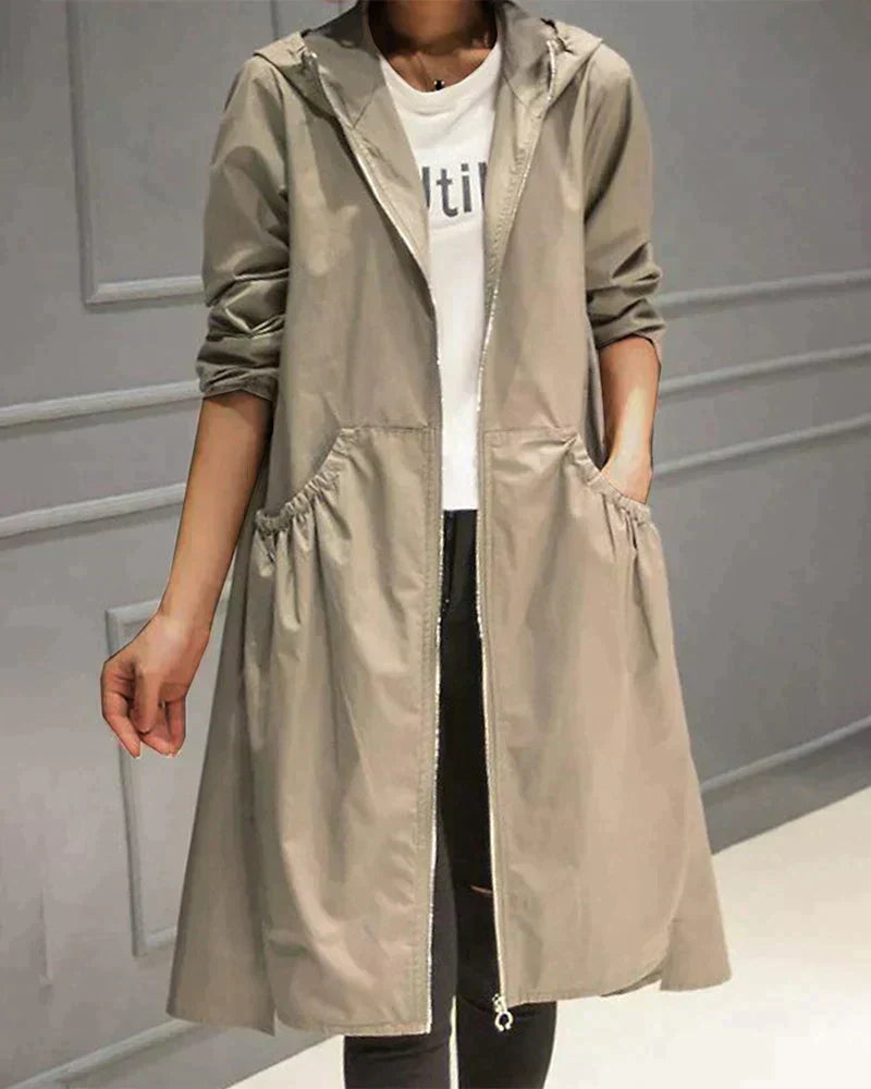 Veste imperméable femme – Coupe ample – Longueur genou – Capuche – Manches longues – Poches fonctionnelles – Fermeture zippée