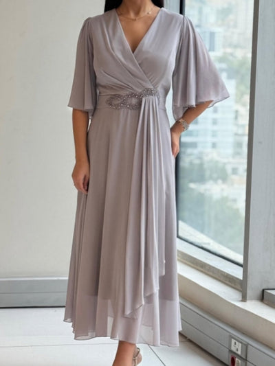 Robe longue élégante en mousseline à col en V