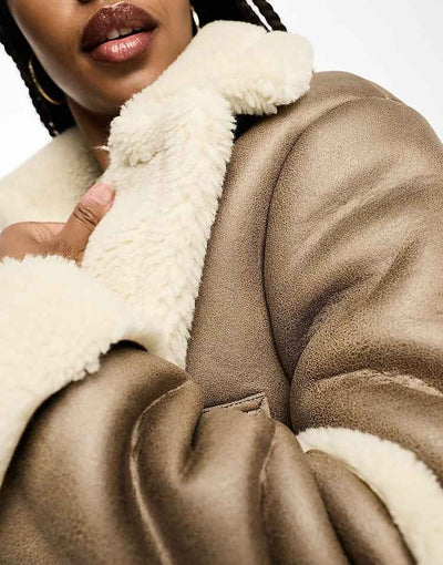 Veste aviateur courte en imitation peau de mouton