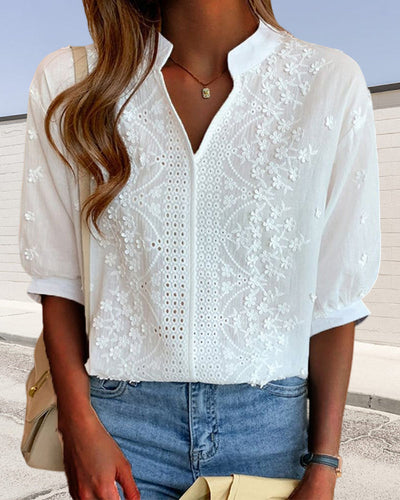 Blouse à col en V avec manches bouffantes et dentelle