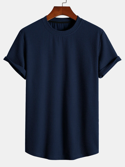 T-shirt côtelé à ourlet arrondi et coupe près du corps