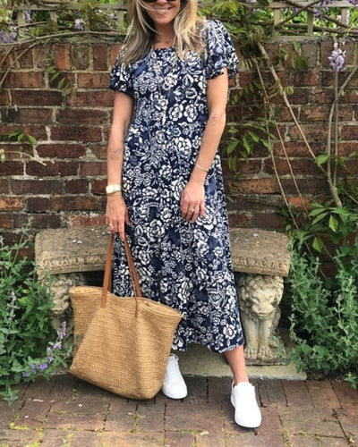 Zaar| Robe longue à manches courtes avec motif floral