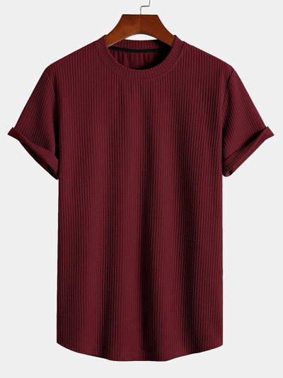 T-shirt côtelé à ourlet arrondi et coupe près du corps