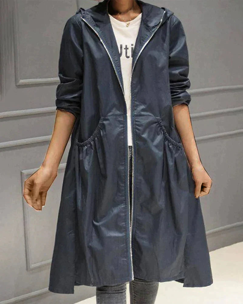 Veste imperméable femme – Coupe ample – Longueur genou – Capuche – Manches longues – Poches fonctionnelles – Fermeture zippée