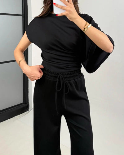 Ensemble deux pièces haut et pantalon irréguliers à la mode