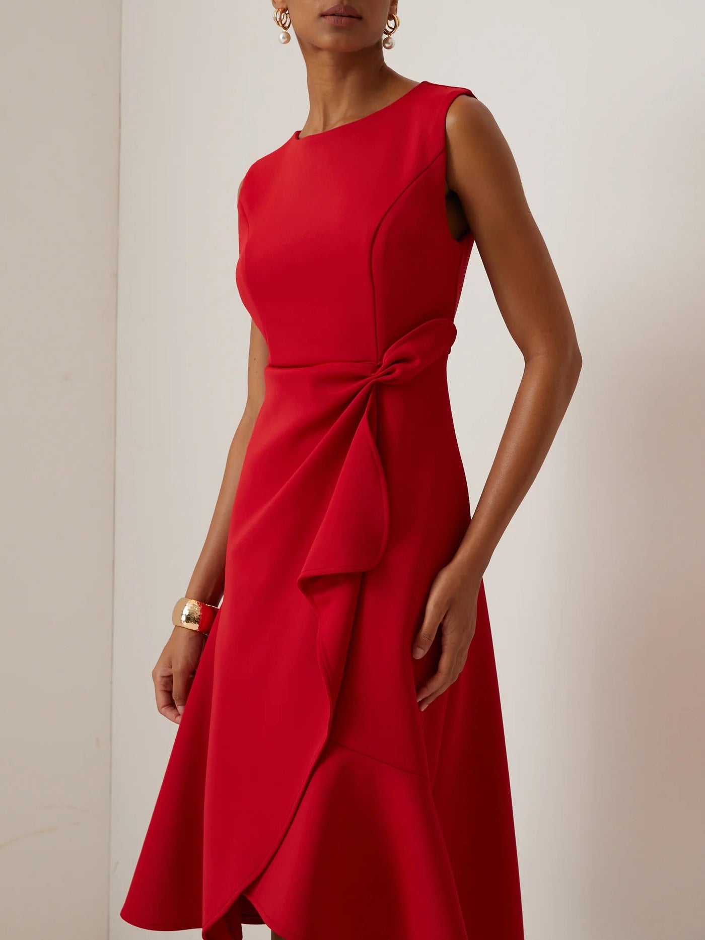 Robe sans manches avec taille torsadée