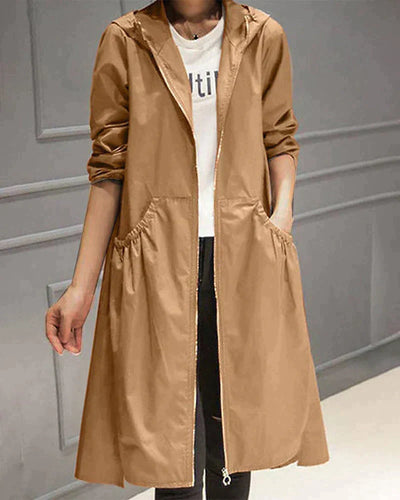 Veste imperméable femme – Coupe ample – Longueur genou – Capuche – Manches longues – Poches fonctionnelles – Fermeture zippée