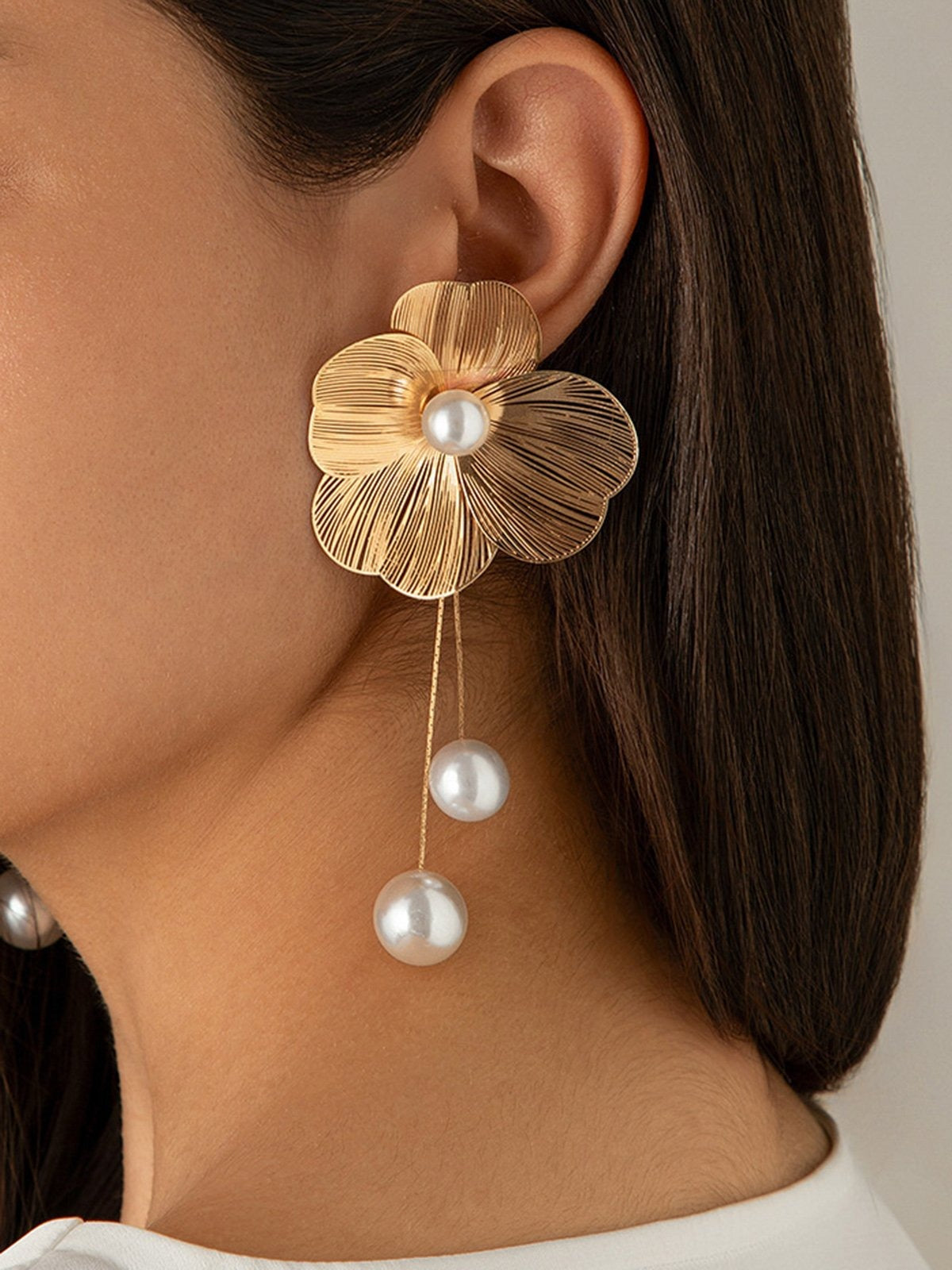 Boucles d'oreilles en perles et fleurs creuses