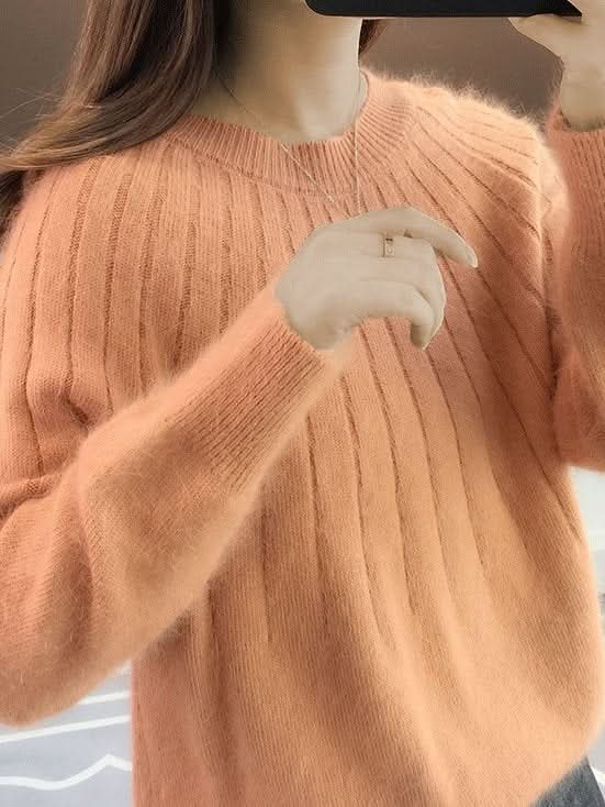 Arya | pull-over en peluche de couleur unie