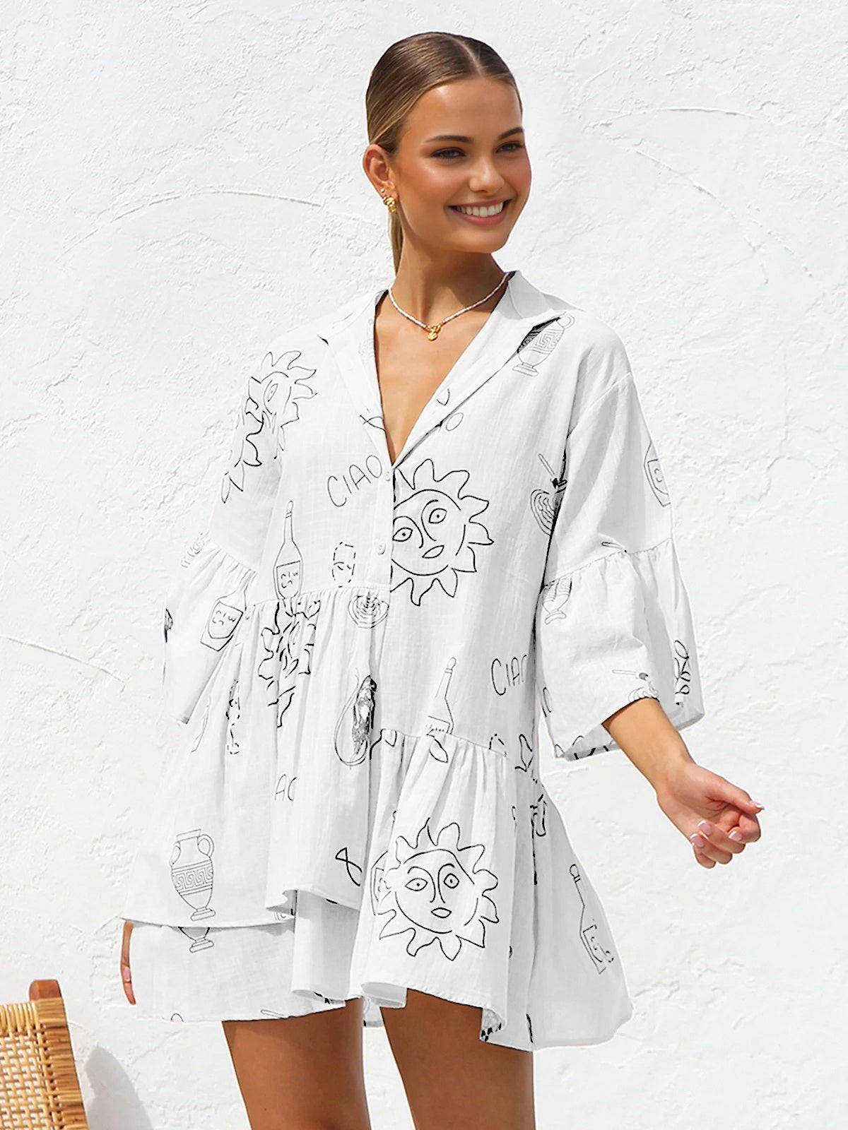 Robe courte oversize avec imprimé soleil
