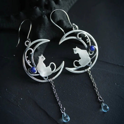 Boucles d'oreilles boho en argent avec de la zircone bleue - Mino