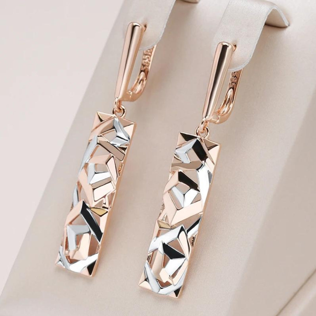 Boucles d'oreilles géométriques élégantes en or rose et en argent
