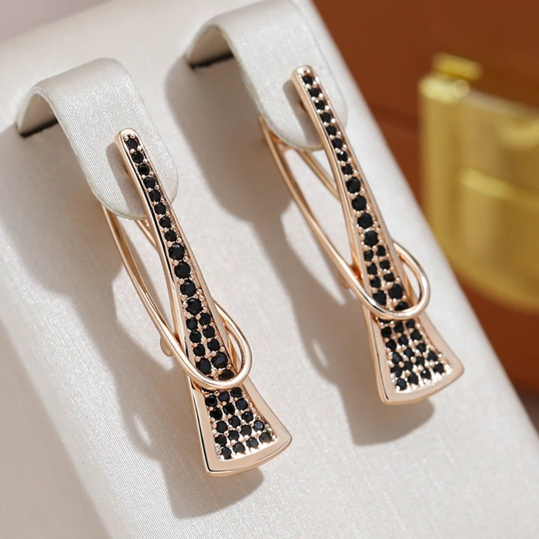 Boucles d'oreilles élégantes avec cristal noir plaqué or