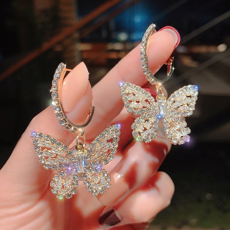 Boucles d'oreilles en or papillon avec zirconium