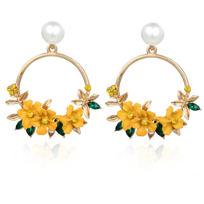 Boucles d'oreilles florales en forme de boucle avec perle