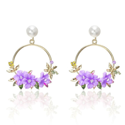 Boucles d'oreilles florales en forme de boucle avec perle