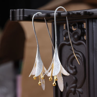 Boucles d'oreilles en fleurs argentées