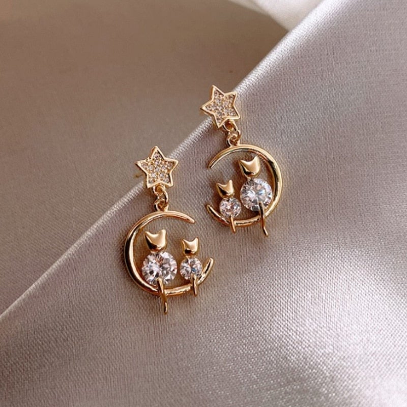 Boucles d'oreilles en or avec famille de chats
