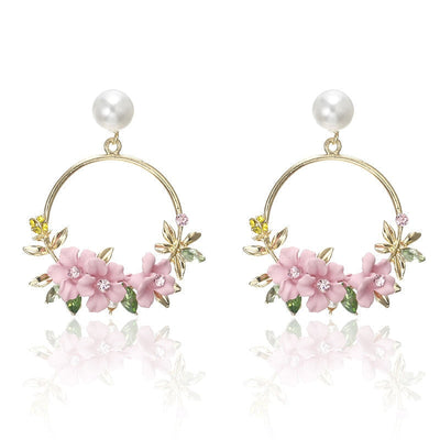 Boucles d'oreilles florales en forme de boucle avec perle