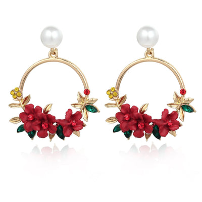 Boucles d'oreilles florales en forme de boucle avec perle