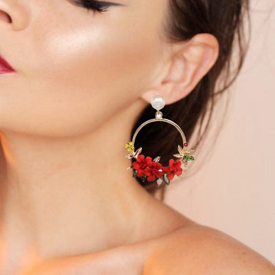 Boucles d'oreilles florales en forme de boucle avec perle