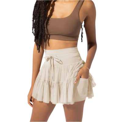 Mini jupe taille haute short intégré plis praticité élégance