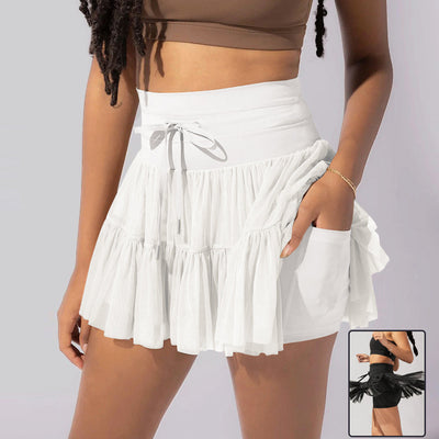 Mini jupe taille haute short intégré plis praticité élégance