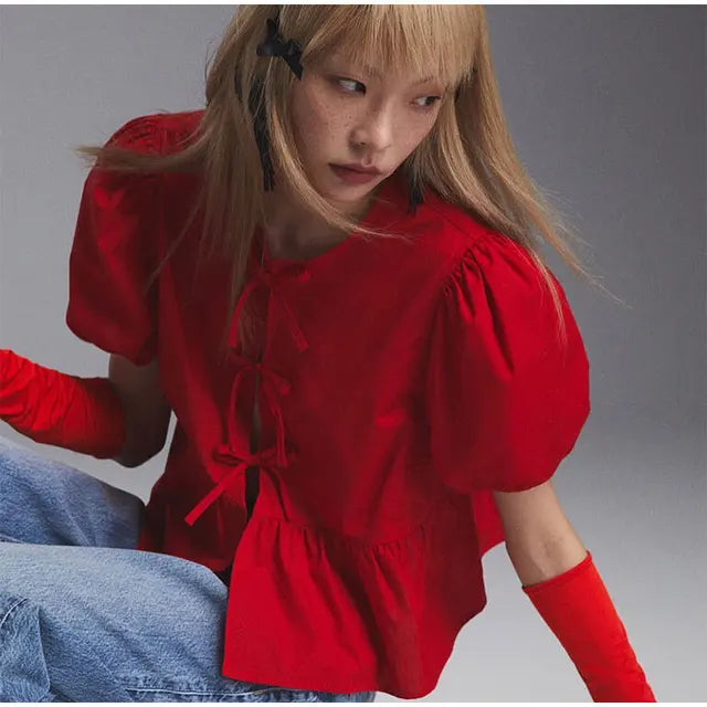 Rose | Blouse tendance avec motif léopard et manches bouffantes