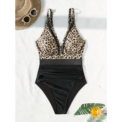 Maillot de bain femme – Une pièce – Décolleté plongeant – Détail en mesh – Coupe échancrée