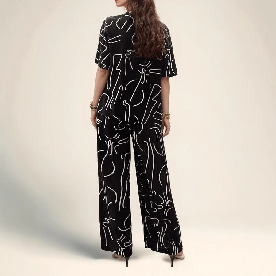 Blouse femme oversize – Tissu respirant – Manches courtes – Imprimé abstrait – Coupe fluide