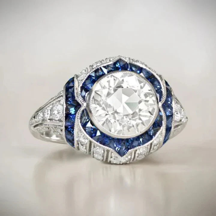 Bague en argent avec cristaux blancs et bleus arrondis