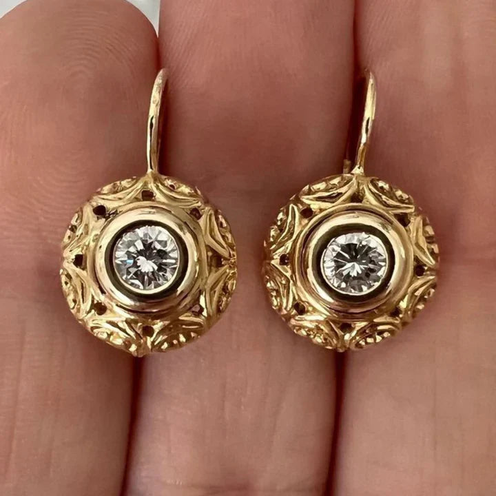 Boucles d'oreilles rondes en verre blanc et or