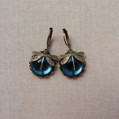 Boucles d'oreilles en cristal bleu avec cristal bleu en or antique
