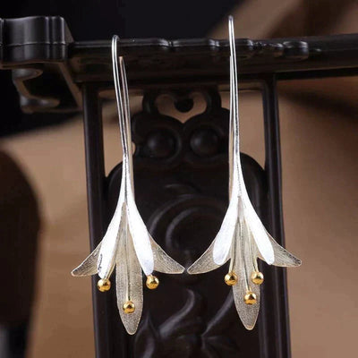 Boucles d'oreilles en fleurs argentées