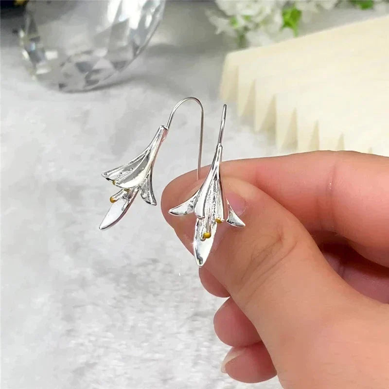 Boucles d'oreilles en fleurs argentées