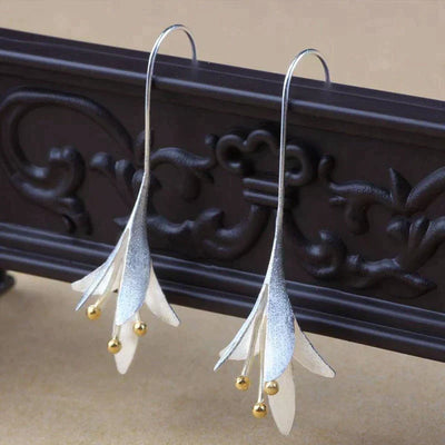 Boucles d'oreilles en fleurs argentées