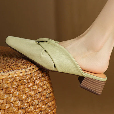 Mules en cuir à nœud papillon