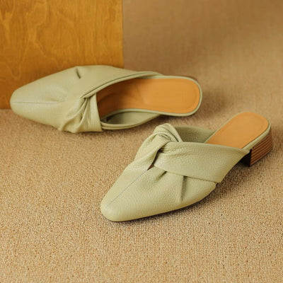 Mules en cuir à nœud papillon