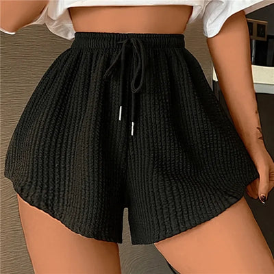 Noor - Short avec cordon de serrage et jambes larges