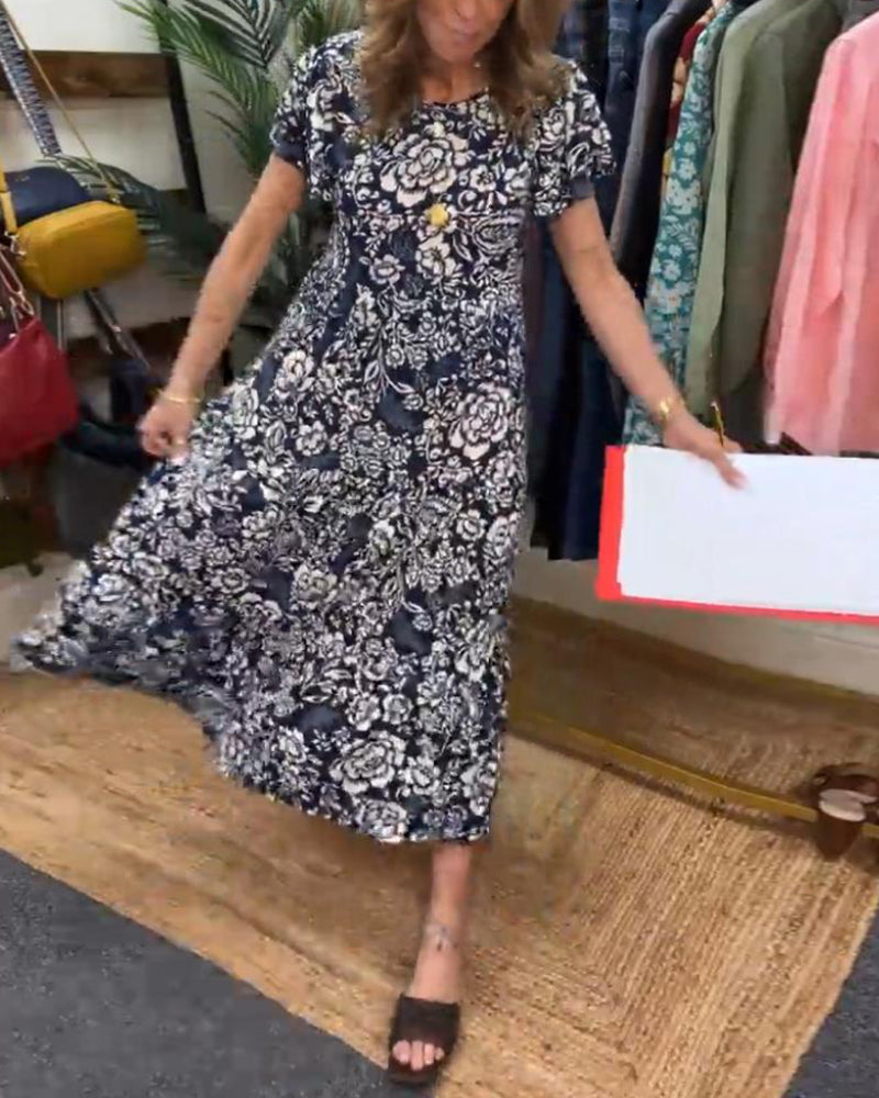 Zaar| Robe longue à manches courtes avec motif floral