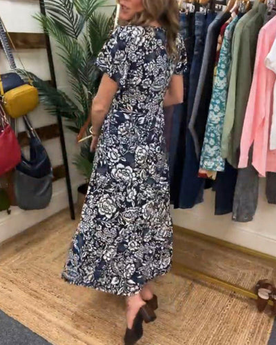 Zaar| Robe longue à manches courtes avec motif floral