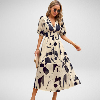 Robe Midi | Motif Géométrique | Volume & Modernité