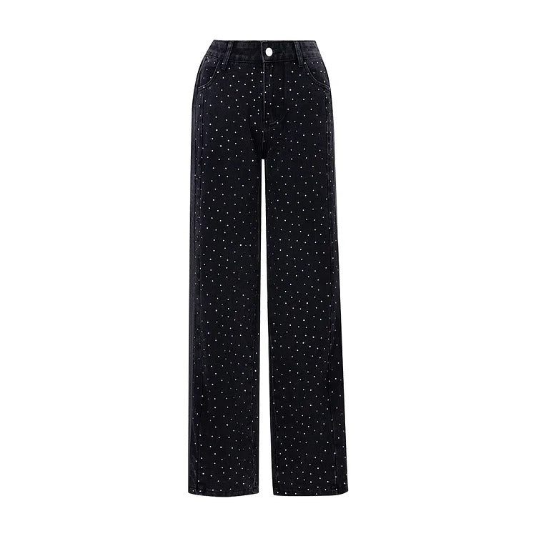 Jean taille haute orné de strass et boutonné sur le côté