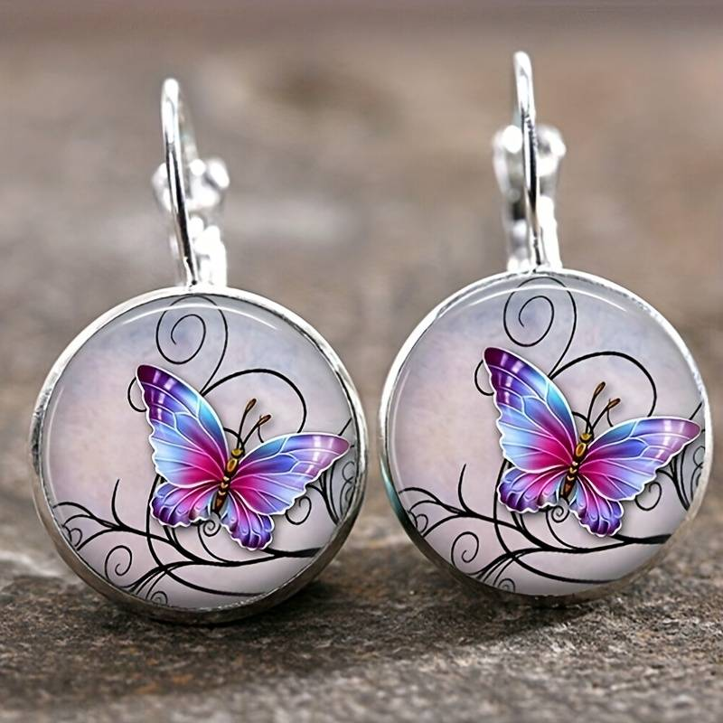 Boucles d'oreilles rondes avec cristal et papillons