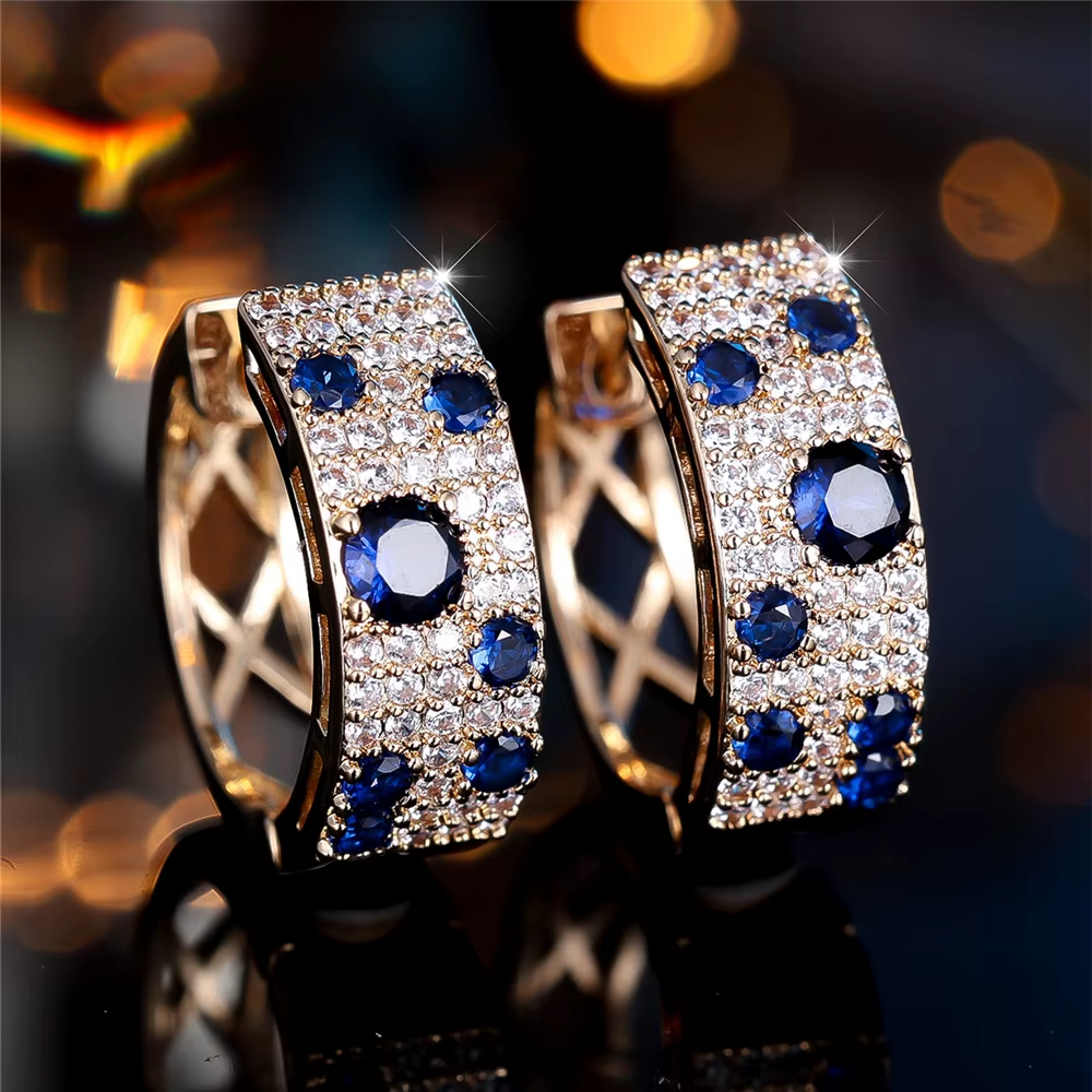 Boucles d'oreilles bleues élégantes et brillantes