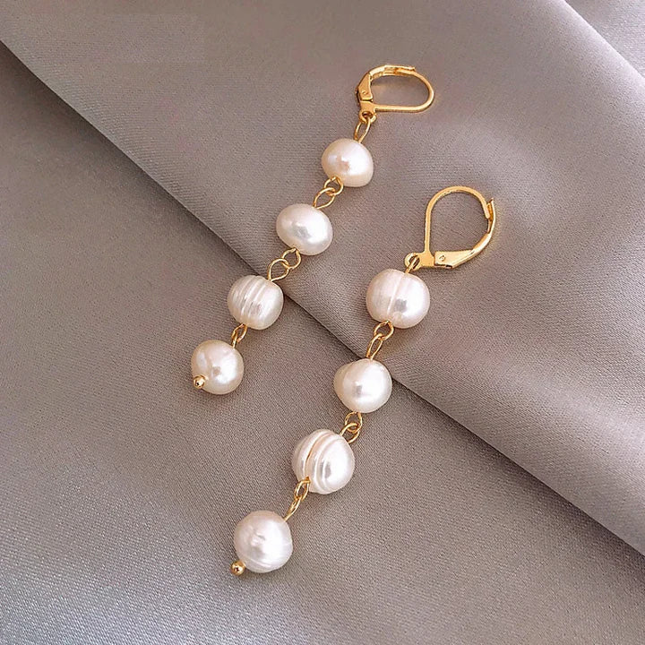 Boucles d'oreilles en or avec perles