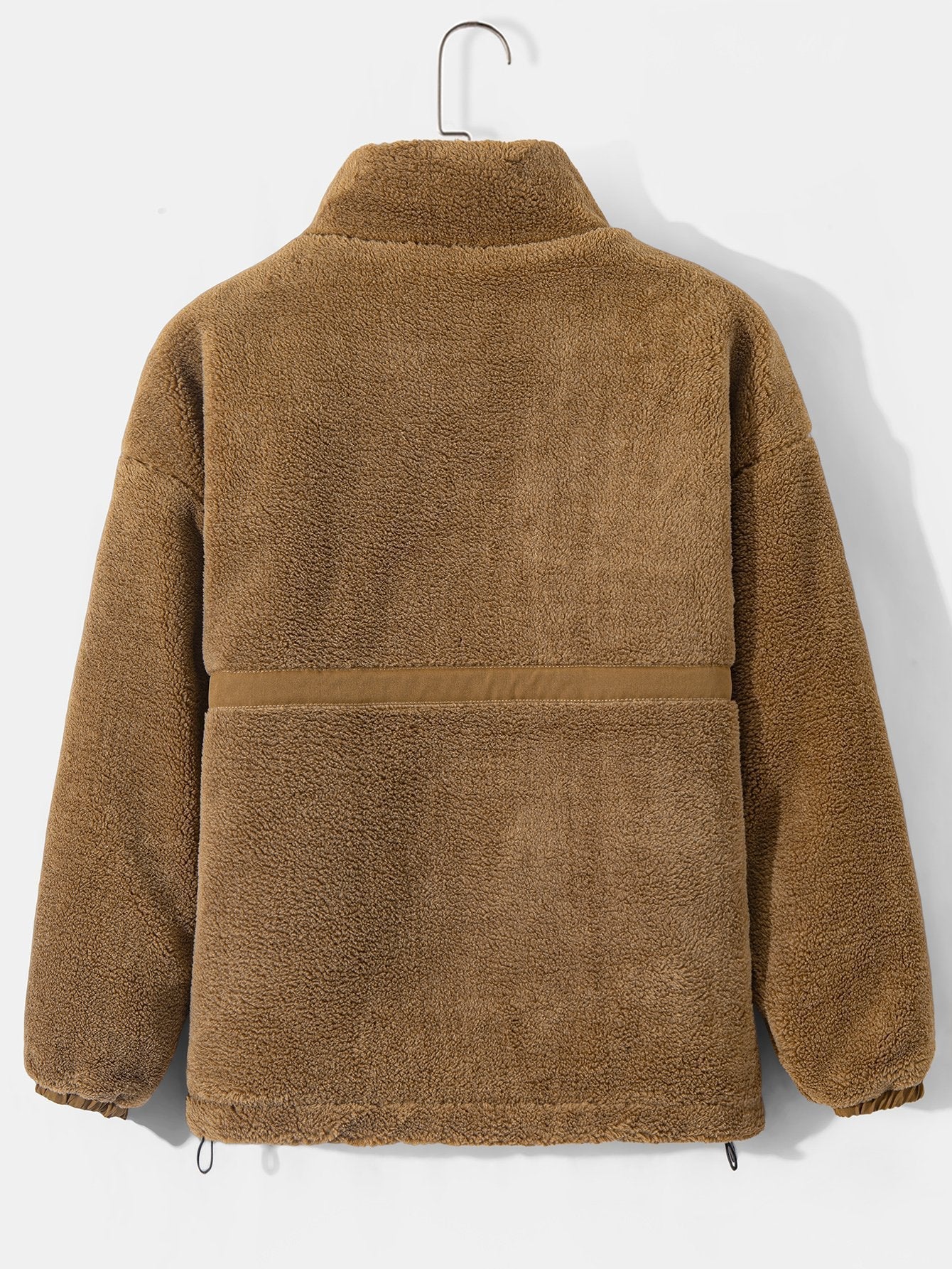 Manteau zippé en polaire matelassée doublée