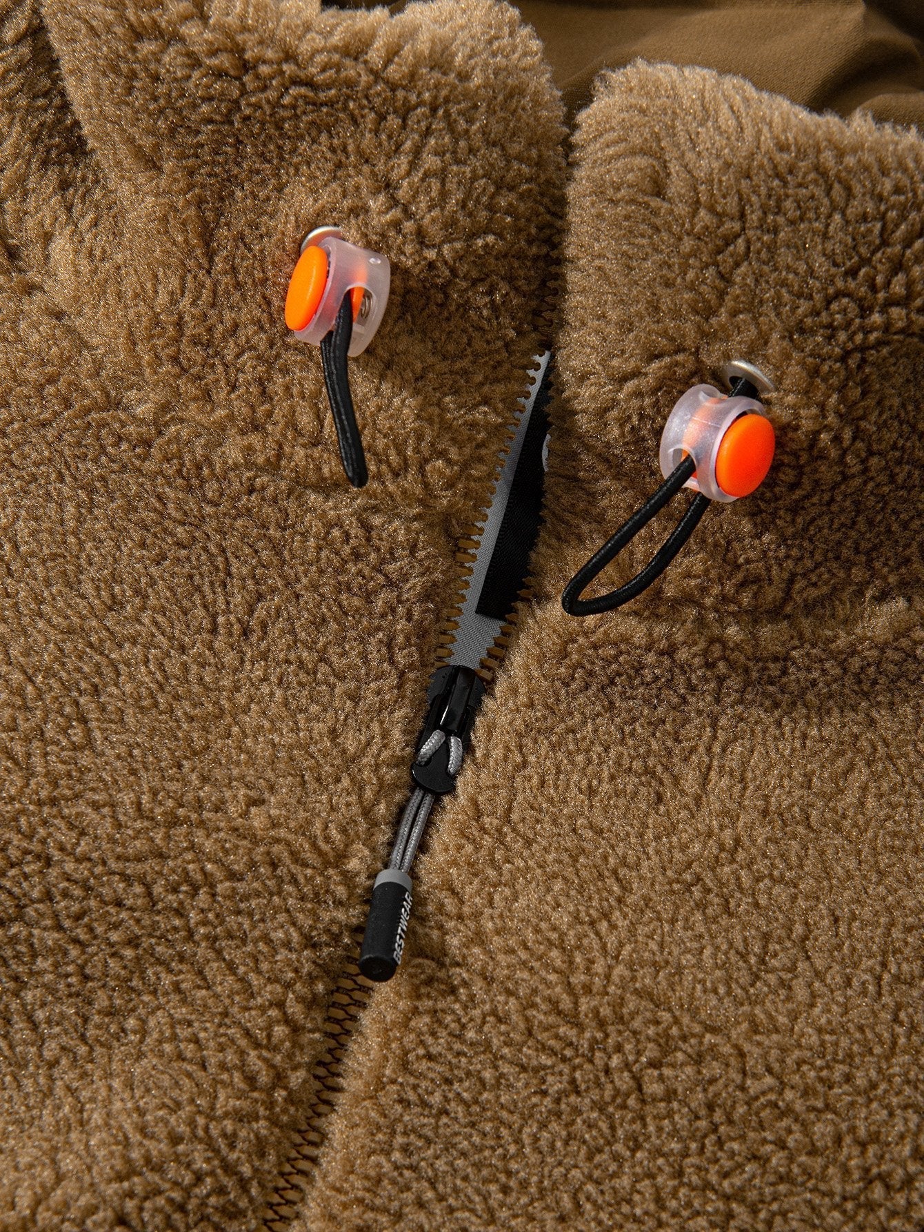 Manteau zippé en polaire matelassée doublée
